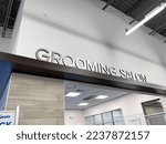 Small photo of Orlando, FL USA- November 21, 2020: A Grooming Salon sign at a Petsmart Pet Store in Orlando, Florida.