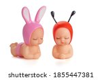 Two Cute Dolls In Beetle And...