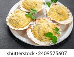 Small photo of stuffed seafood scallop Saint Jacques terrine souffle baked fresh eating cooking appetizer meal food snack on the table copy space food background rustic top view
