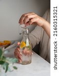 Detox Water. Woman Holding A...