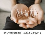 Small photo of Hands holding diversity family, happpy carer and volunteer, disable nursing home, rehabilitation and health insurance concept