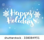 brush  lettering on a blue... | Shutterstock .eps vector #338084951