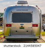 Small photo of PENSACOLA, FLORIDA - OCTOBER 20, 2021: Closeup of back of Airstream travel trailer parked in rv park