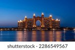 Small photo of Experience the magic of Dubai's Atlantis hotel at night with our stunning landscape photograph. The iconic hotel, located on the man-made island of Palm Jumeirah