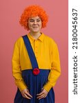 Girl In A Clown Costume And A...
