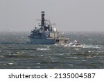 Small photo of PORTSMOUTH, UK – 7TH MAR 2022: An Admiralty pilot launch astern of HMS RICHMOND as the Royal Navy frigate headed into the choppy Solent waters. The ship sailed for NATO exercise Cold Response 2022
