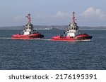 Small photo of PORTSMOUTH, UK – 9TH JUN 2022: The port tugs SCOTSMAN and YORKSHIREMAN approach the harbour entrance. The vessels are operated by SMS Towage