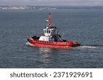 Small photo of PORTSMOUTH, UK – JUN 21ST 2023: The SMS Towage operated tugboat YORSHIREMAN heading out into The Solent