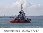 Small photo of PORTSMOUTH, UK – AUG 20TH 2023: The SMS Towage tug SCOTSMAN ready to escort a large ship out of harbour