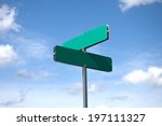 blank street sign against sky and clouds