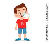 happy cute kid boy drink fresh... | Shutterstock .eps vector #1582812694