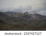 Small photo of Avi Kwa Ame National Monument Nevada - Low Storm Clouds Over Granite Outcrops in the Newberry Mountains, Spirit Mountain Wilderness