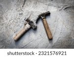 Small photo of Old sledge hammer and old Claw hammer that lacks maintenance until rust corrodes the iron with concrete floor background, safety construction, safety workplace .Can rusty injury causes tetanus.