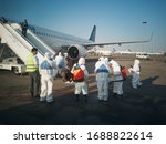 Small photo of ALMATY, KAZAKHSTAN - 29 MARCH 2020. A medical and customs control team meets a repatriation flight with passengers from coronavirus-infected countries for quarantine. Almaty airport.