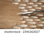 Small photo of Wood carving with a metal gouge tool, woodcraft, handmade texture on the surface showing craftsmanship and slow living. Vintage old authentic technique showing the woodgrain close up