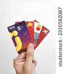Small photo of Jakarta, Indonesia - May 31, 2023: Various banks that are widely used in Indonesia issue many types of ATM, debit and credit cards to facilitate customer transactions
