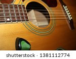 Small photo of The guitar thudded with chorded applause for the singer.