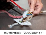 technician fixing  cooker power ... | Shutterstock . vector #2090100457