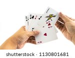 Joke card in the hand of man isolated on white background, Man is playing game card.
