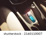 A lighter placed in a car on a...