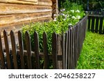 Wooden Fence With Garden And...