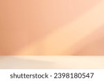 Small photo of Empty room wall painted in peach color. Minimalistic abstract apricot background for product presentation. Color of the year 2024 Peach Fuzz