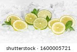 Small photo of Staying healty. Healthy lifestyle. Lemon, Green Lemon and mint with crushed ice / ices cubes. Lemon ring. Ice background. Healty 2020. Health 2020