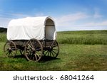 A Pioneer Covered Wagon On The...