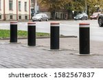 Automatic security Bollards used to protect public and private property and vulnerable and areas, and act as both a physical and visual barrier. 