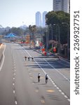 Small photo of Netanya, Israel - September 25th 2023: Yom Kippur (Day of Atonement) in Israel. Bicyclists ride on the Highway 2, free of cars