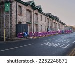 Small photo of Kendal, Cumbria, UK - January 20 2023: Safety barriers surrounding the old bonded warehouse during its conversion to a Lidl store. Lidl is a German discount supermarket expanding in the UK