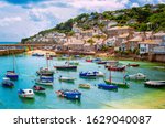 Mousehole village and fishing port in Cornwall, England, United Kingdom. Mousehole lies within the Cornwall Area of Outstanding Natural Beauty