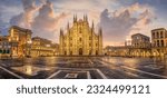 Small photo of Panoramic view of Piazza del Duomo square with Milan Cathedral, Duomo di Milano, and Galleria Vittorio Emanuele II, Italy, on sunrise. Milan Cathedral is one of the largest churches in the world.