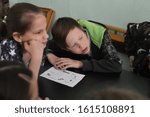 Small photo of Syktyvkar, Russia - June, 2019 - Children watch an educational film about Bulgaria.