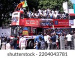 Small photo of View of Sri Lankan Cricket team members celebrate their victory during the Asia Cup Twenty20 tournament in Dubai, retuning to Colombo, Sri Lanka. 13th September 2022