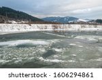 Frozen mountain river in winter