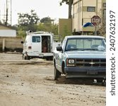 Small photo of New Orleans, United States - September 23 2009 : cars are abandoned and have been stripped of every thing still OK after huricane Katrina