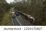 Small photo of Log truck rolled over after crash on the Portland-Nelson Road, Australia - October 21, 2016. The driver was uninjured.