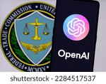 Small photo of OPENAI company logo seen on smartphone,and FTC Federal Trade Comission logo on the background. Concept. Stafford, United Kingdom, April 3, 2023