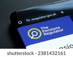 Small photo of The Pensions Regulator logo seen on their website on the smartphone. TPR is a Public body which regulates pension schemes in the UK. Stafford, United Kingdom, October 29, 2023