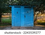 Traditional Wooden Outhouse In...