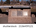 Small photo of LOS ALAMOS, NEW MEXICO - DECEMBER 13, 2013: Plaque marks Los Alamos Scientific Laboratory as a national historic landmark, at Ashley Pond, in Manhattan Project National Historic Park.