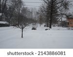 Small photo of OBERLIN, OHIO, USA - JANUARY 02, 2014: A cold and snowy day on Morgan Street, during a snowstorm.