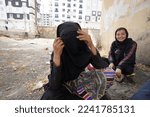 Small photo of VAN,TURKEY - 2021: Afghan refugees fleeing the Taliban rule rest in barracks, under bridges and derelict buildings in Van city in eastern Turkey after 25 days of marching