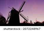 Silhouette of an old windmill...