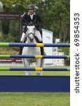 Small photo of PORTIMAO, PORTUGAL - JUNE 13: Unidentified participant in action at International Show Jumping CS4 Portimao on June 13, 2010 in Portimao, Portugal.