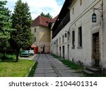 Small photo of Lviv, Ukraine - May 31 2004: Medieval buildings in Lviv between Hlyniany Gate and the Bernadine Monastery. The buildings are part of the fortifications of the monastery. Lviv is also known as Lvov.