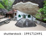 Small photo of PANAMA, SRI LANKA - AUGUST 07, 2019 : The Great Sudar Shana Cave at the Buddhist Madya Mandalaya near Panama on the east coast. This cave was offered to the clergy by the Mittra (Son of Nadika).