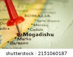 Small photo of Location Mogadishu in Somalia, map with push pin closeup, travel and journey concept with marker, Africa