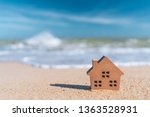 Small Home Model On Sand Beach...